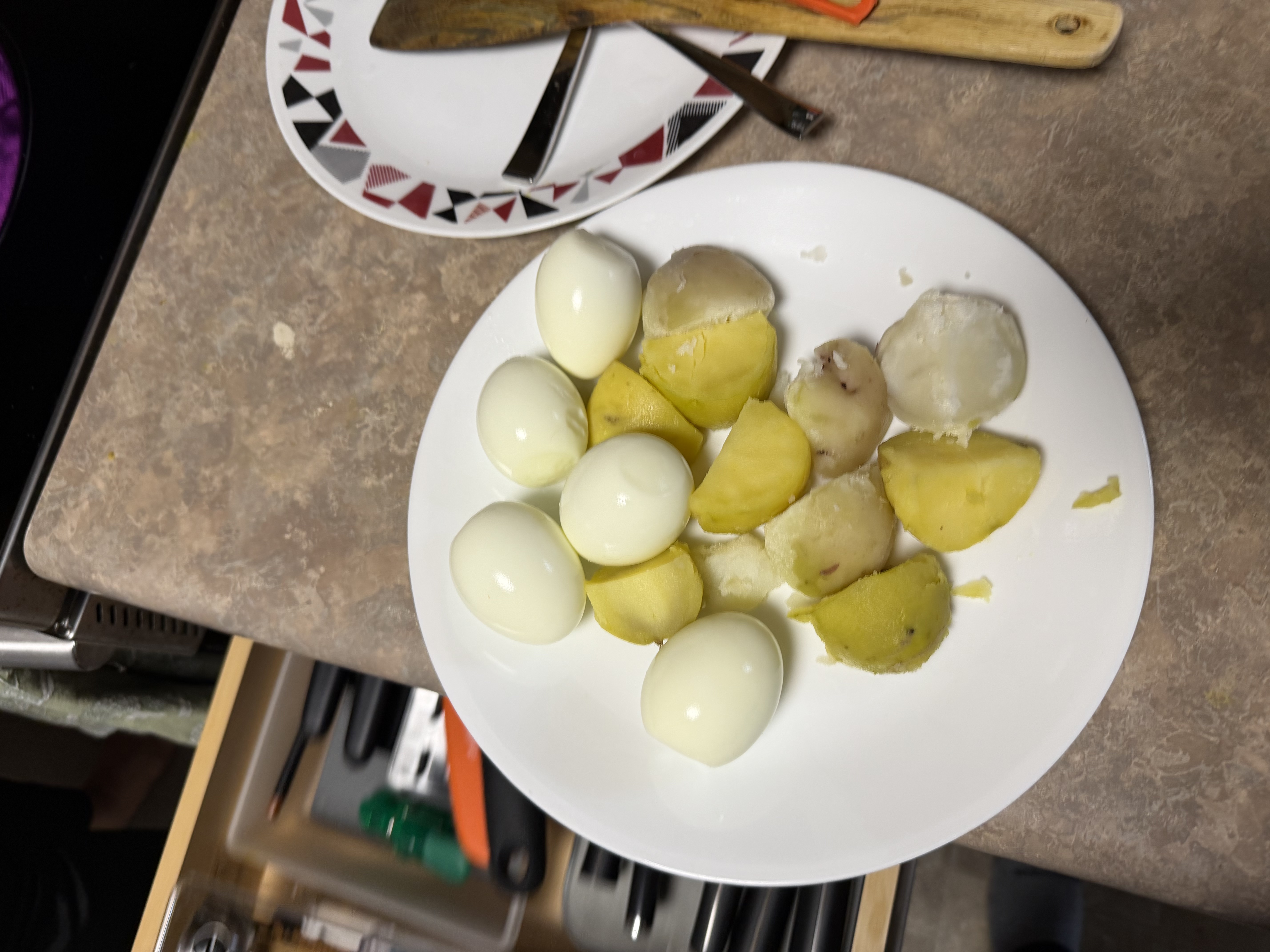 Boiled eggs and potatoes